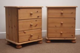 Pair solid pine bedside chests, three drawers, bun feet, W51cm, H62cm,