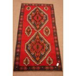 Old Baluchi red ground rug, 220cm x 112cm Condition Report <a href='//www.