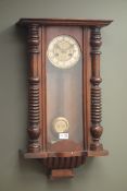 Late 19th century walnut cased Vienna style wall clock with compensating grid iron pendulum,
