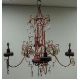 Painted cast metal chandelier in the form of a Pagoda with teardrop and cut glass drops,