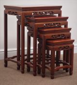 Chinese rosewood nest of four tables, dragon carved frieze, W51cm, H66cm,