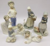 Lladro figures comprising two Angels, boxed, Shepherd Boy, boxed, Girl Kissing,