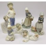 Lladro figures comprising two Angels, boxed, Shepherd Boy, boxed, Girl Kissing,