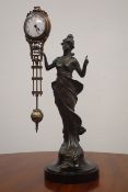 20th century Junghans mystery clock, bronze spelter figure,