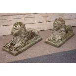 Pair weathered composite stone recumbent garden lions, W32cm, H50cm,