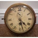 Early 20th century brass bulkhead clock, circular Roman dial with subsidiary seconds dial,
