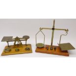 Brass and oak Postal scales stamped with weights and another set with weights stamped GPO,