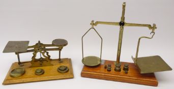 Brass and oak Postal scales stamped with weights and another set with weights stamped GPO,