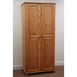 Solid pine double wardrobe, two doors enclosing fitted interior, bun feet, W82cm, H180cm,