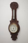Early 20th century carved oak barometer (H75cm),