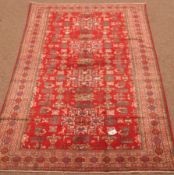 Ardabil red ground rug, repeating border,