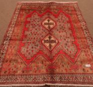 Afshar red ground rug, repeating border,