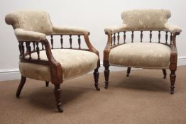 Pair late Victorian walnut framed tub shaped chairs, upholstered in a beige floral fabric,