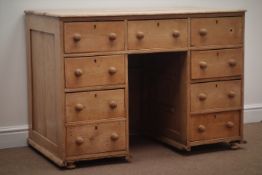 19th century pine twin pedestal desk, rectangular top above nine drawers, W109cm, H79cm,