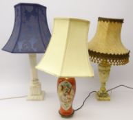 Two alabaster table lamps and a ceramic table lamp decorated with dragons,