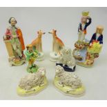 Victorian and later Staffordshire figures; Couple fishing in Turkish dress,