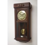 Early 20th century carved oak cased wall clock, circular Arabic dial,