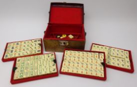 Early 20th century Mahjong set in tooled leather case,