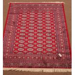 Bokhara red ground rug, 200cm x 140cm Condition Report <a href='//www.