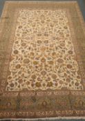 Kashan beige ground rug, floral field, repeating border,