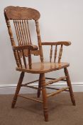 Beech armchair, carved and shaped cresting rail above stick back,