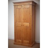 Solid pine double wardrobe enclosed by two panelled doors, W98cm, H197cm,
