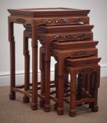Chinese rosewood nest of four tables, pierced frieze, W49cm, H69cm,