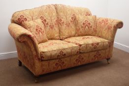 Duresta three seat sofa upholstered in a red and gold floral fabric (W220cm) with a matching
