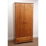 Solid pine wardrobe, two doors above drawer, bun feet, W86cm, H178cm,