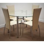 Glass top dining table with two D shaped fold out leaves on brushed metal legs and a set of four
