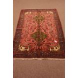 Hamadan rose ground rug, two central medallions,
