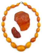 Butterscotch amber bead necklace and two amber pieces Condition Report Bead necklace
