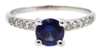 White gold single stone round sapphire ring, with diamond set shoulders, hallmarked 14ct,