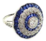 Sapphire and diamond circular platinum (tested) ring,