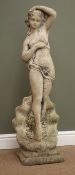 Composite stone figure of a lady, square base,