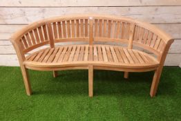 Solid teak garden bench, curved back, serpentine seat,