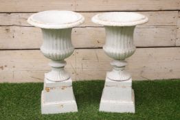 Pair victorian style white finish cast iron urns on plinths D29cm,