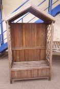 Wooden garden seat, trellis sides with pitched canopy,