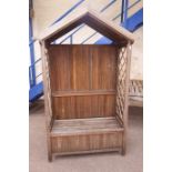 Wooden garden seat, trellis sides with pitched canopy,