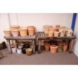 Two wood slatted potting tables,
