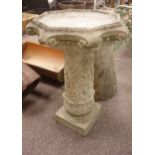Composite stone hexagonal shallow bird bath on twist moulded and ivy berry foliage decorated