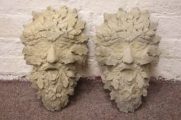 Pair composite stone greenman wall mounted plaques,