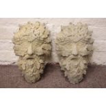 Pair composite stone greenman wall mounted plaques,