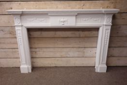 Large 20th century Adams style reverse breakfront fire surround, white painted wood,