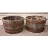 Pair metal bound wooden oak barrel platers,