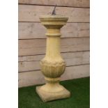 Contemporary circular lead sundial on composite stone pedestal base,