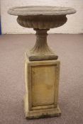 Classical style composite stone centrepiece urn, comprising an urn, base and square column, D60cm,