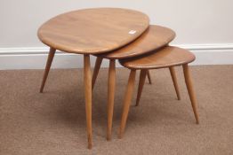 ercol pebble nest of three tables, elm tops, tapering splayed supports,