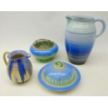 Four pieces of Shelley Art Deco Harmony drip glaze ceramics comprising a large jug of ribbed form,