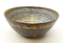 Studio pottery bowl with unglazed band, marked P.S.